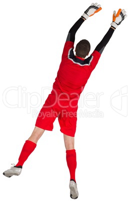 Fit goal keeper jumping up