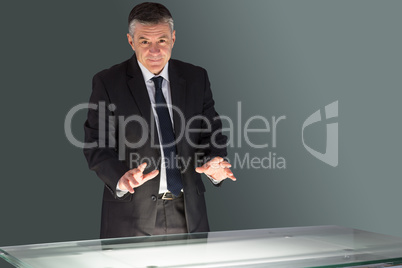 Concentrating businessman looking at desk Concentrating businessman looking at desk