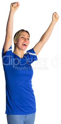 Cheering football fan in blue jersey