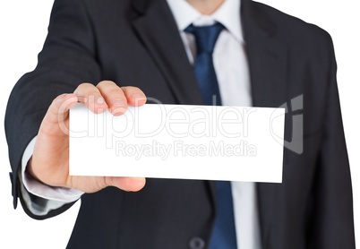 Mature businessman showing blank card