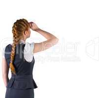 Redhead businesswoman standing and looking