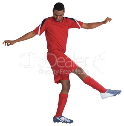 Football player in red kicking