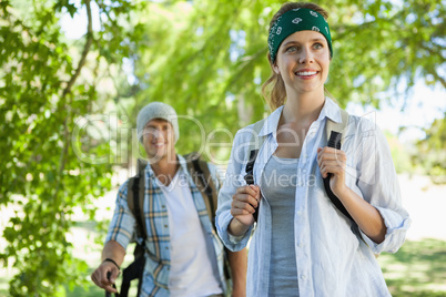 Happy active couple going on a hike