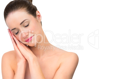Natural beauty posing with hands to face