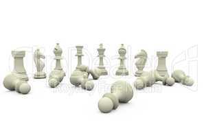 White chess pieces fallen and standing