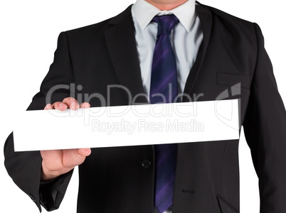 Businessman showing blank white card