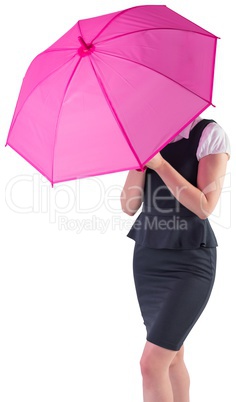 Pretty redhead businesswoman holding umbrella