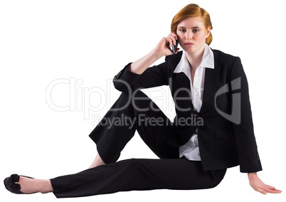 Redhead businesswoman on the phone