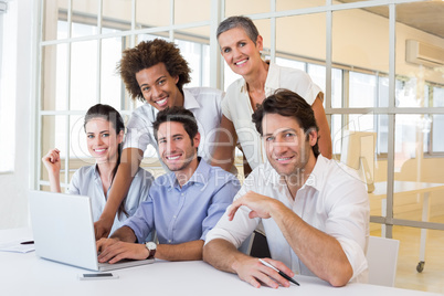 Business people using laptop smile to camera