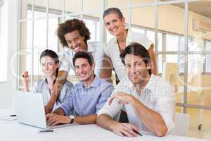 Business people using laptop smile to camera