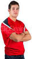 Handsome football fan in red jersey