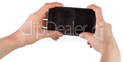 Hands holding smartphone showing screen