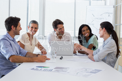 Attractive business people discussing at a meeting