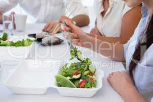 Business people enjoying salad and salad for lunch