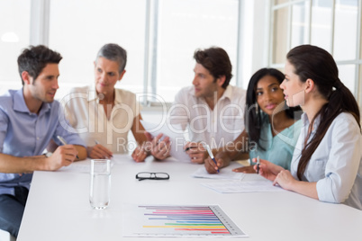 Attractive business people discussing at a meeting