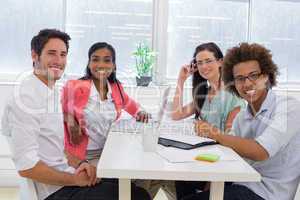 Casual workers meeting at table