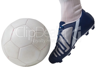 Close up of football player kicking ball