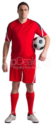 Handsome football player looking at camera Handsome football player looking at camera