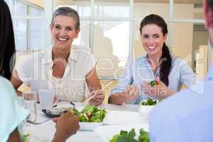 Business people enjoy healthy lunch