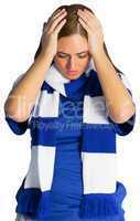 Disappointed football fan looking down