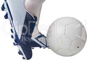 Close up of football player kicking ball