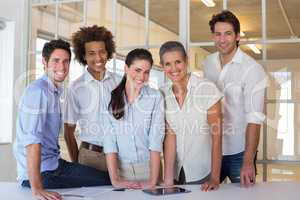 Casual group of coworker friends smiling