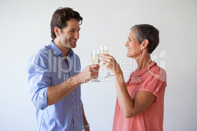 Casual successful business team toasting with champagne