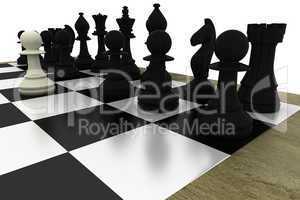 Black chess pieces on board with white pawn