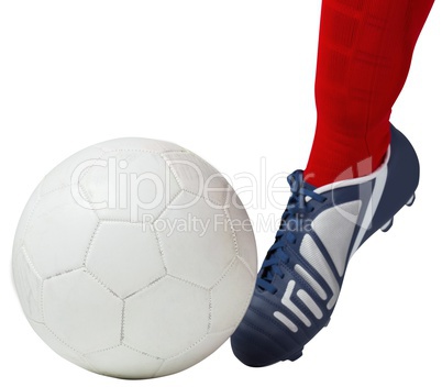 Football player kicking ball with boot