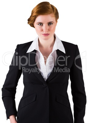 Stylish redhead businesswoman in suit