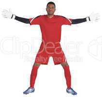 Goalkeeper in red ready to save