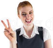Redhead businesswoman showing peace sign
