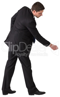 Handsome businessman pulling with hand