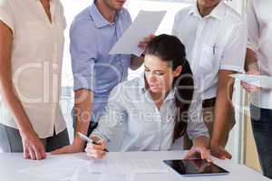 Attractive businesswoman working with businessmen