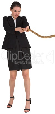 Businesswoman pulling a rope