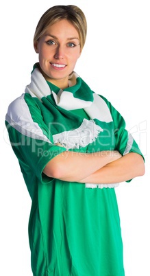 Pretty football fan in green jersey