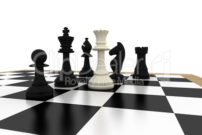 White queen standing with black chess pieces