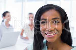 Close up of pretty businesswoman smiling