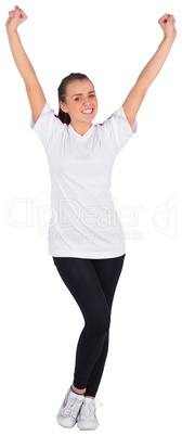 Excited football fan in white cheering