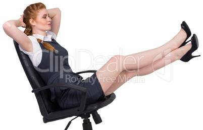 Businesswoman sitting on swivel chair