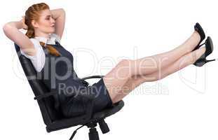Businesswoman sitting on swivel chair