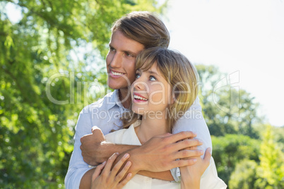 Cute couple hugging in the park