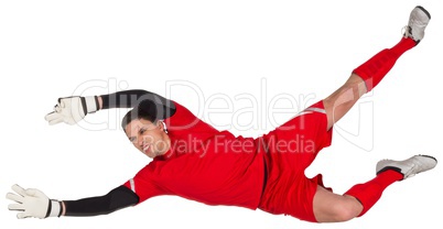 Fit goal keeper jumping up