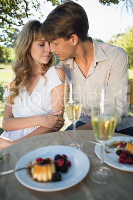 Cute couple embracing while on a date