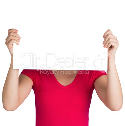 Woman in pink t-shirt showing card