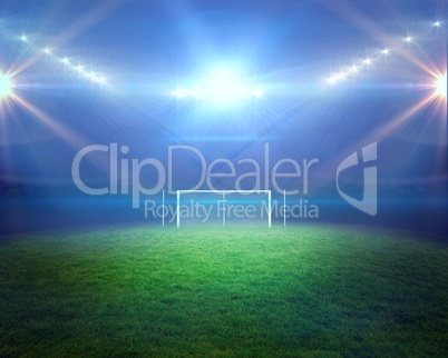 Football pitch with lights and goalpost