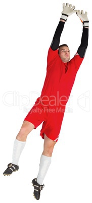 Goalkeeper in red jumping up