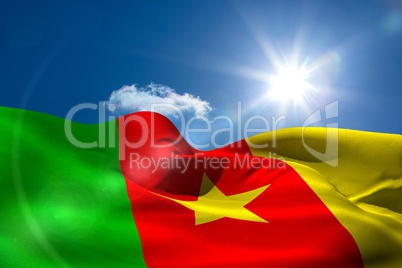 Cameroon national flag under sunny sky