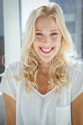 Pretty blonde smiling at camera