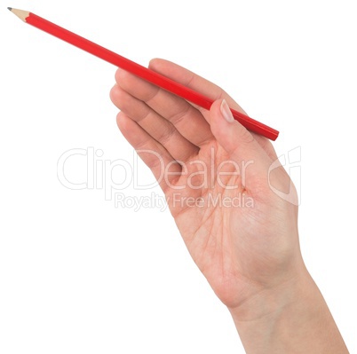 Hand holding red pencil